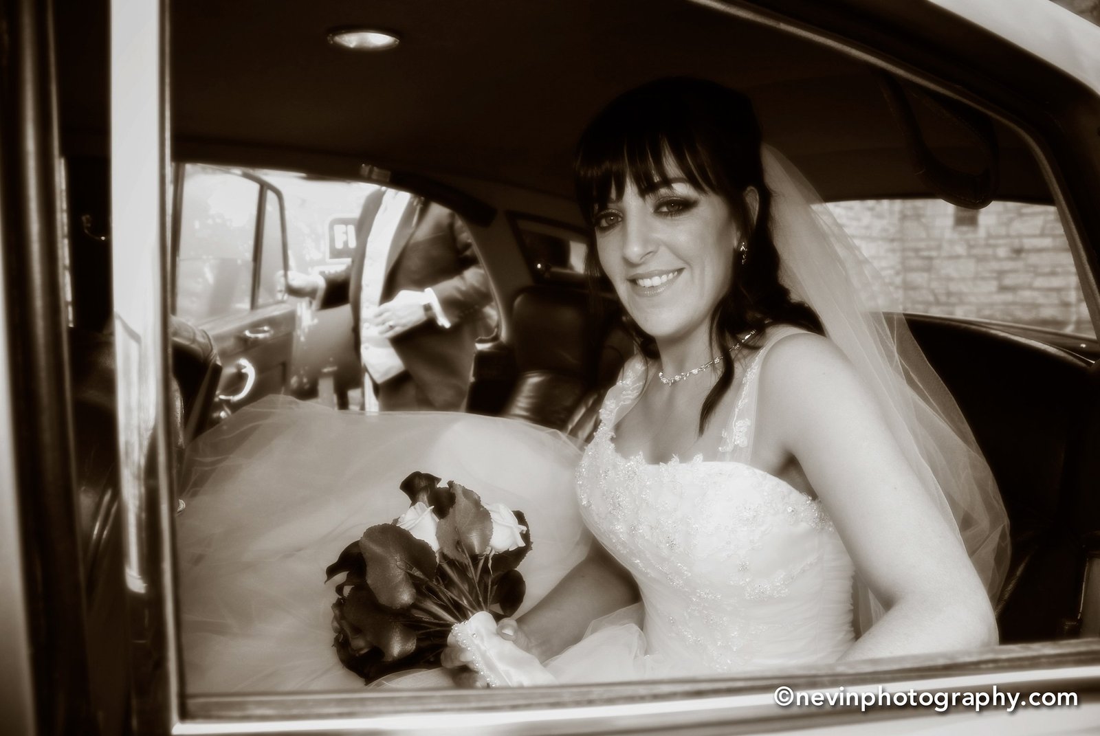 Black and white photo of Bride arriving at the church
